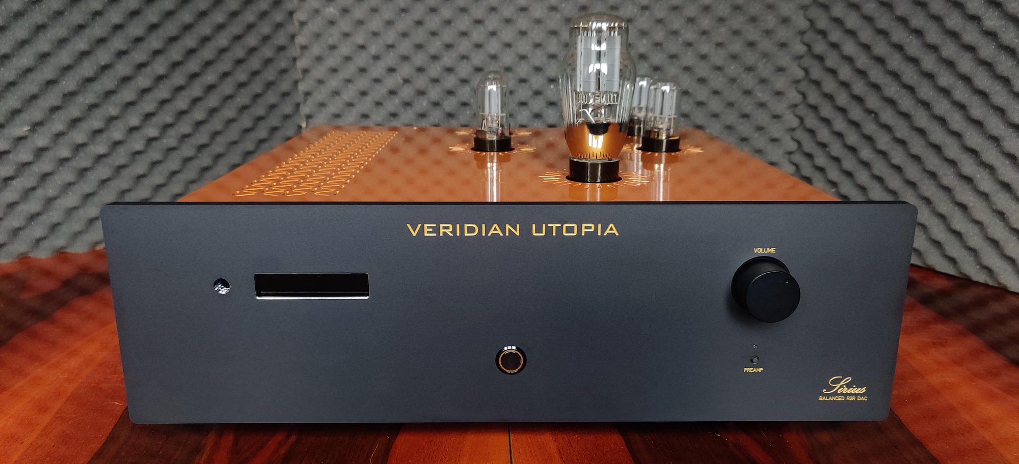 Sirius DAC with a copper top plate and black front panel, the model name engraved in gold